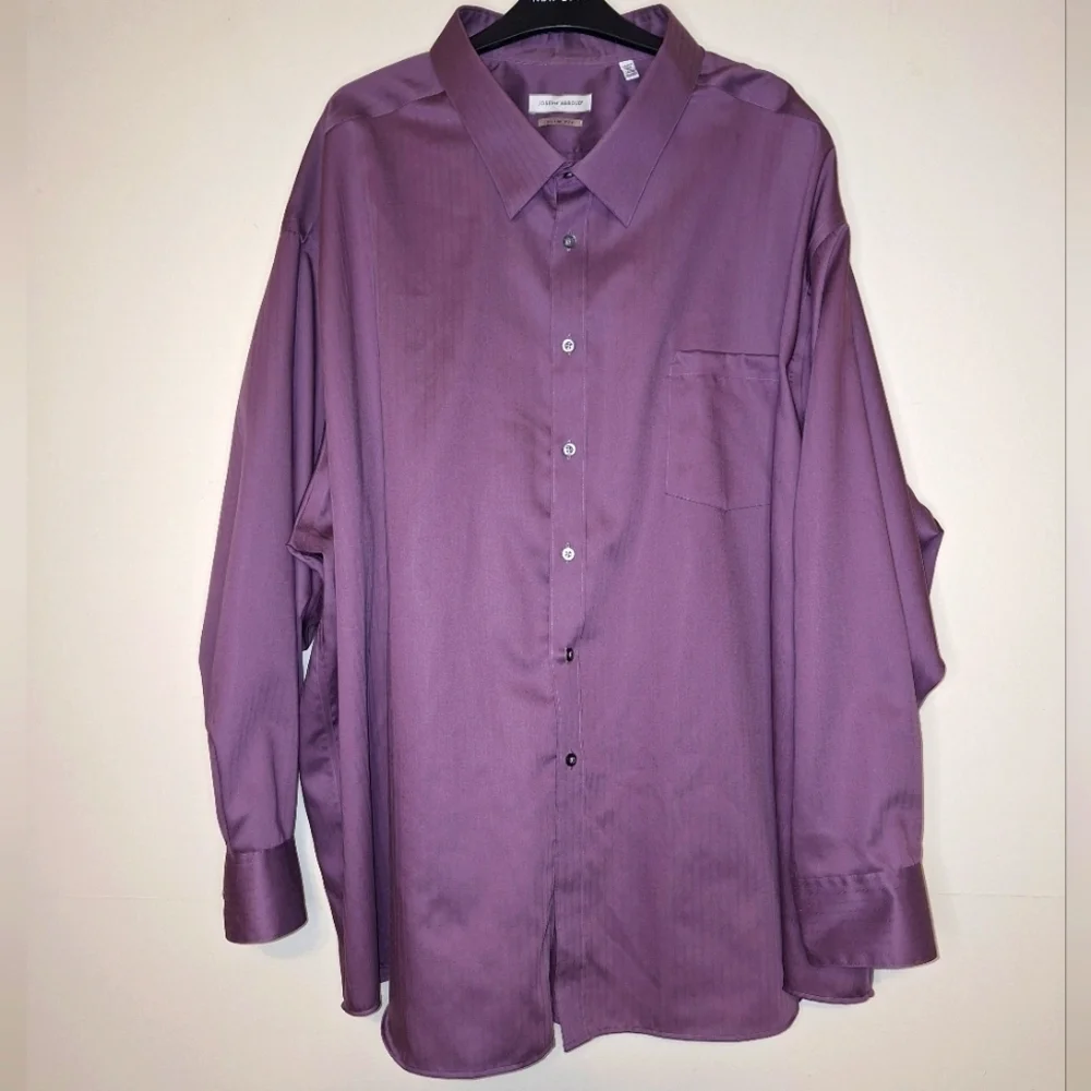 A Joseph Abboud long sleeve button-down shirt in a men's size 34/35.